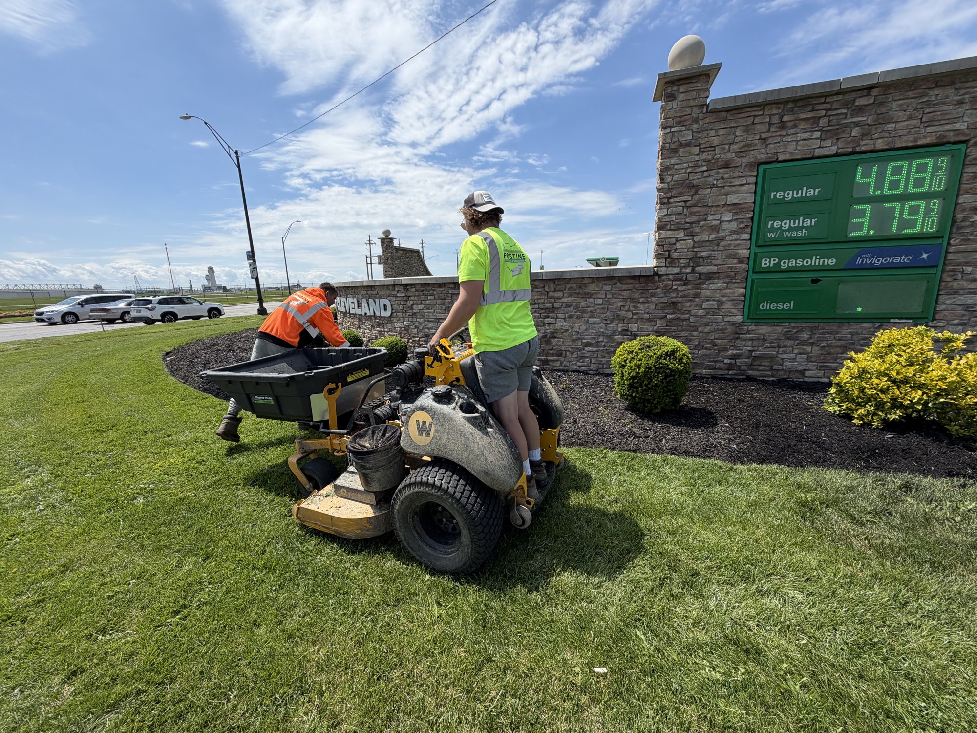 Pristine crew maintaining the Welcome to Cleveland gateway beds