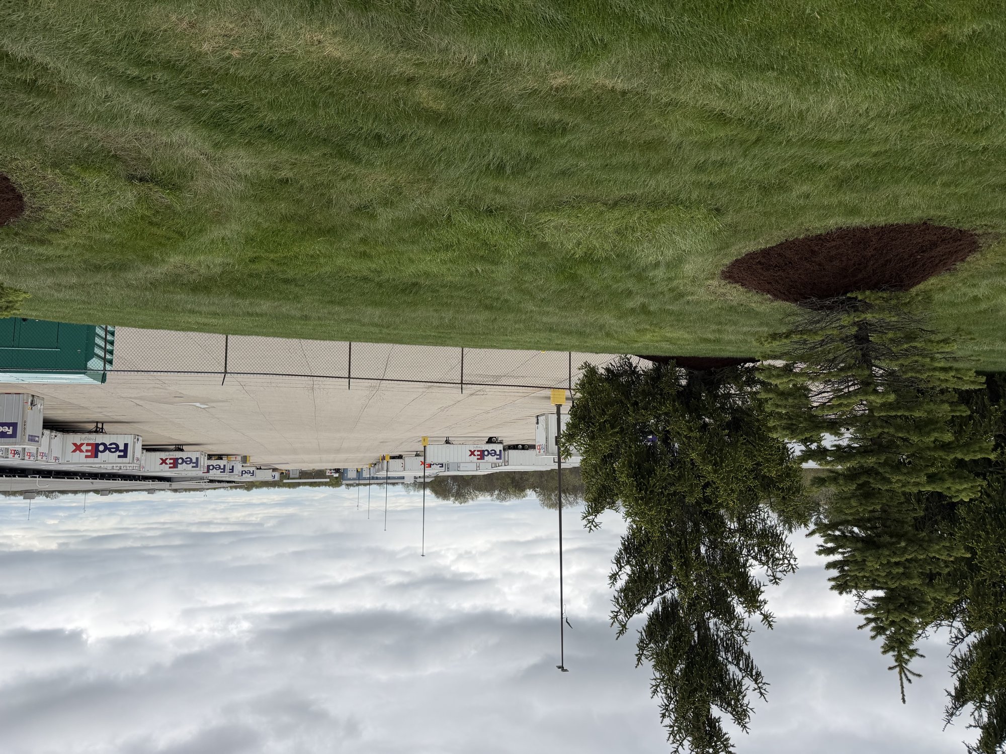 Maintained grounds and fresh mulch at a freight logistics facility